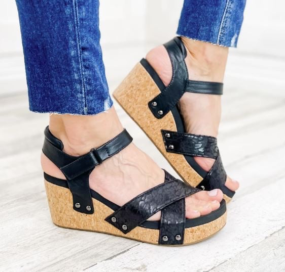 The Kindle Wedge Sandal in Black Leopard