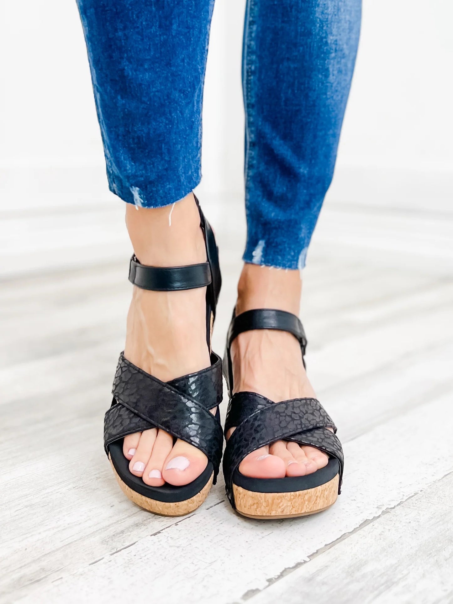 The Kindle Wedge Sandal in Black Leopard